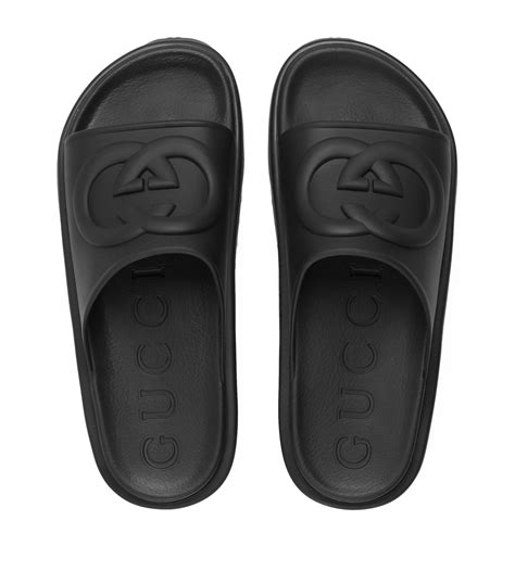 black gucci men sandal woth gold letters|Gucci Men's Leather Interlocking G Slide Sandals .